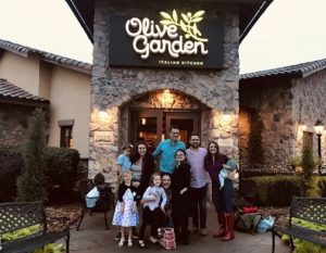 Rachel Mast, her family and Congressman Kevin Yoder all standing outside of Olive Garden.