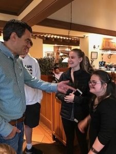 Rachel Mast with Congressman Yoder inside Olive Garden