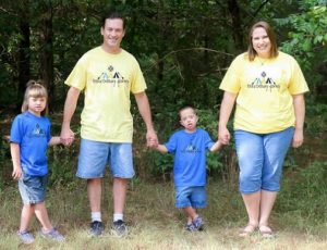 Regina Bradley with husband and two children