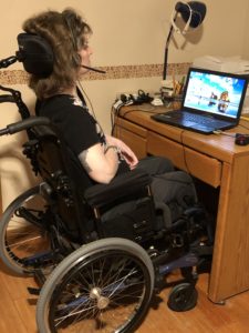 Leah Campbell sitting at her computer