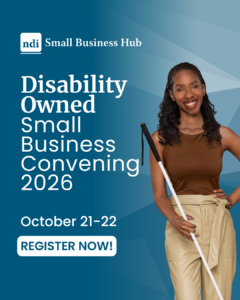Social media graphic promoting the NDI Small Business Hub’s Disability Owned Small Business Convening 2026, October 21–22. A smiling woman holds a white mobility cane against a blue geometric background. Text reads: “Disability Owned Small Business Convening 2026,” “October 21–22” and “REGISTER NOW!”