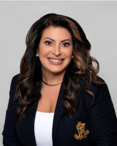 A professional headshot of Yomalis Alvarez.